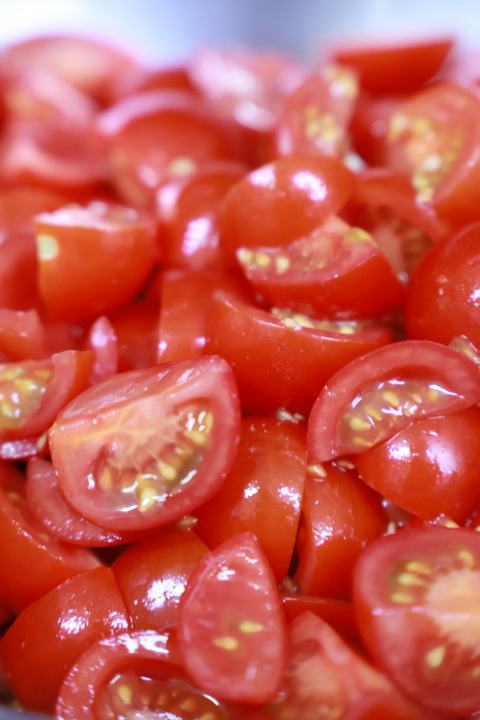 Cherry tomatoes, prepped by hand