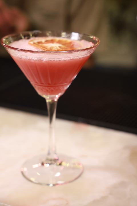 A cocktail on the marble bar